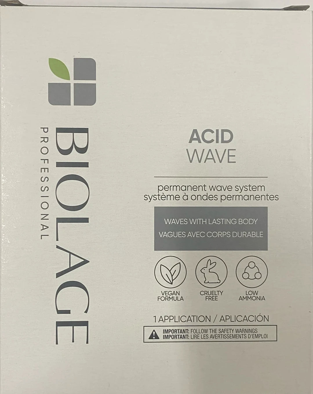 A white rectangular product box for the Biolage Professional Acid Wave permanent wave system, photographed against a plain light background. The box features the Biolage logo and text including 'ACID WAVE' and product benefits.