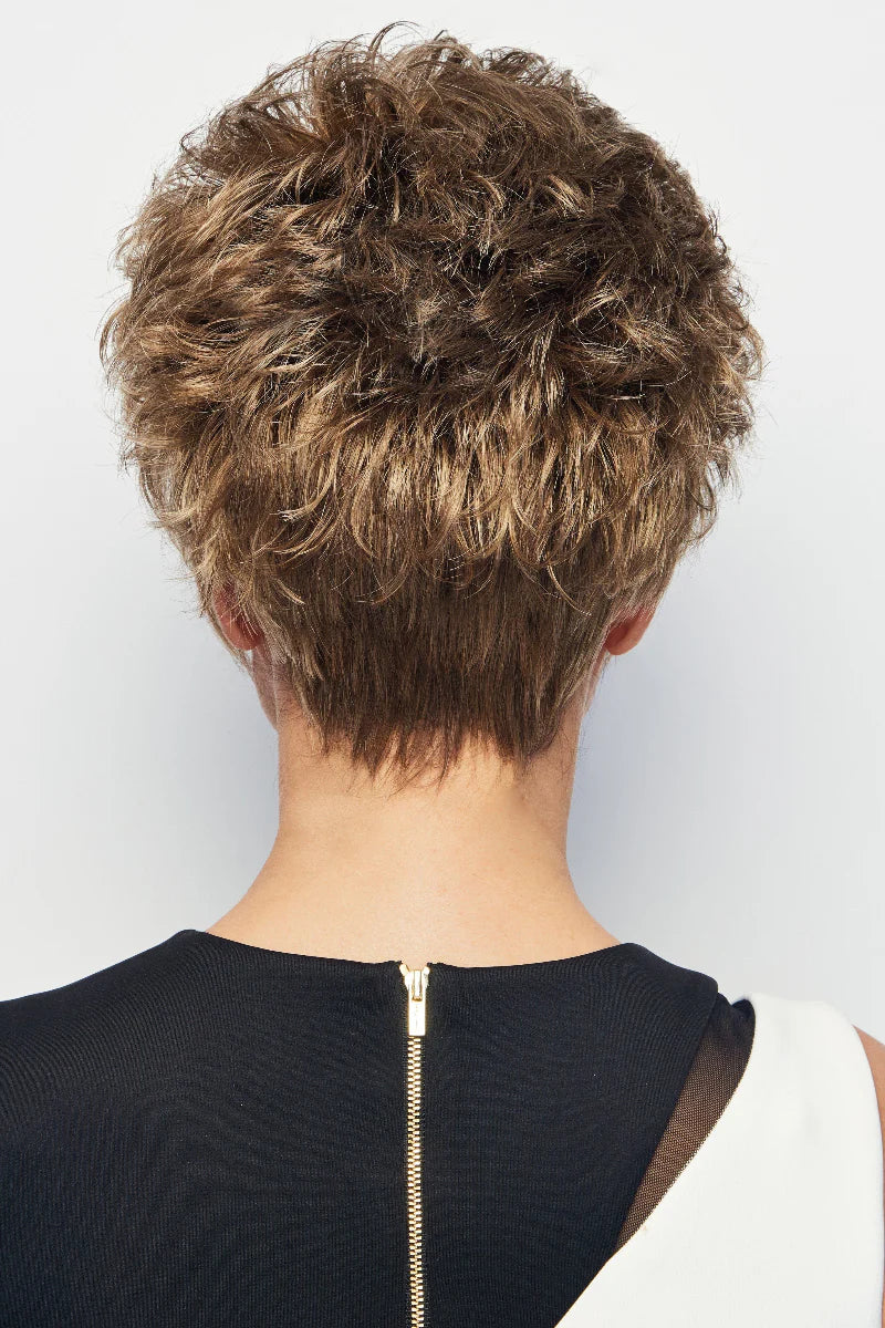 Back view of a person with short, styled hair on a plain background