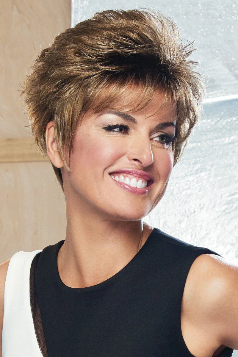 Woman with styled hair in a bathroom setting
