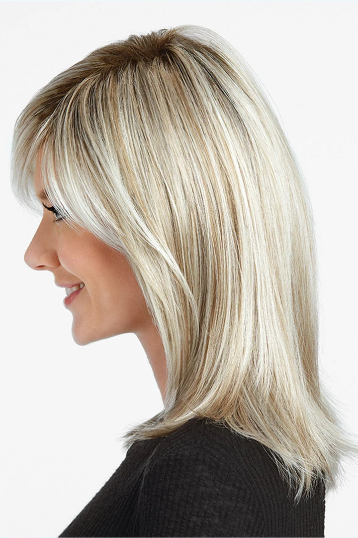 Woman with styled blonde hair on a white background