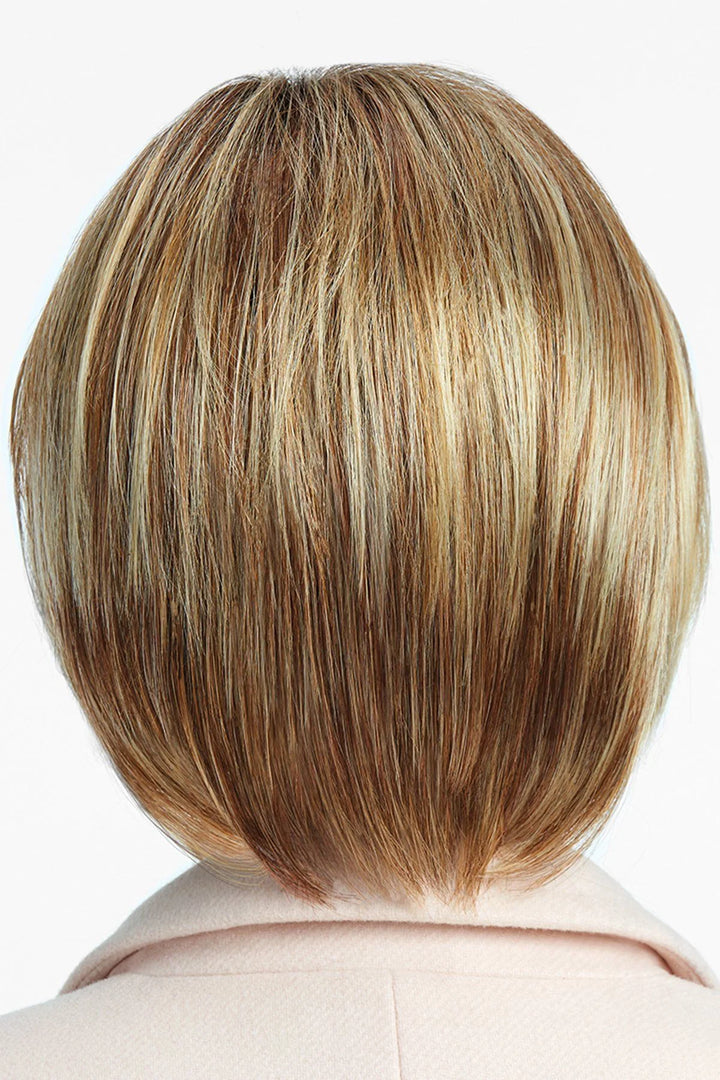 Back view of a person with a short, styled haircut on a white background