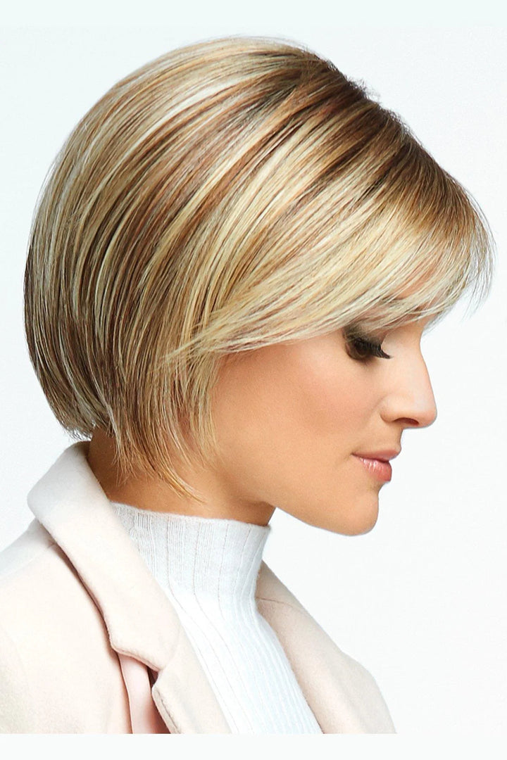 Woman with a stylish haircut and makeup on a white background