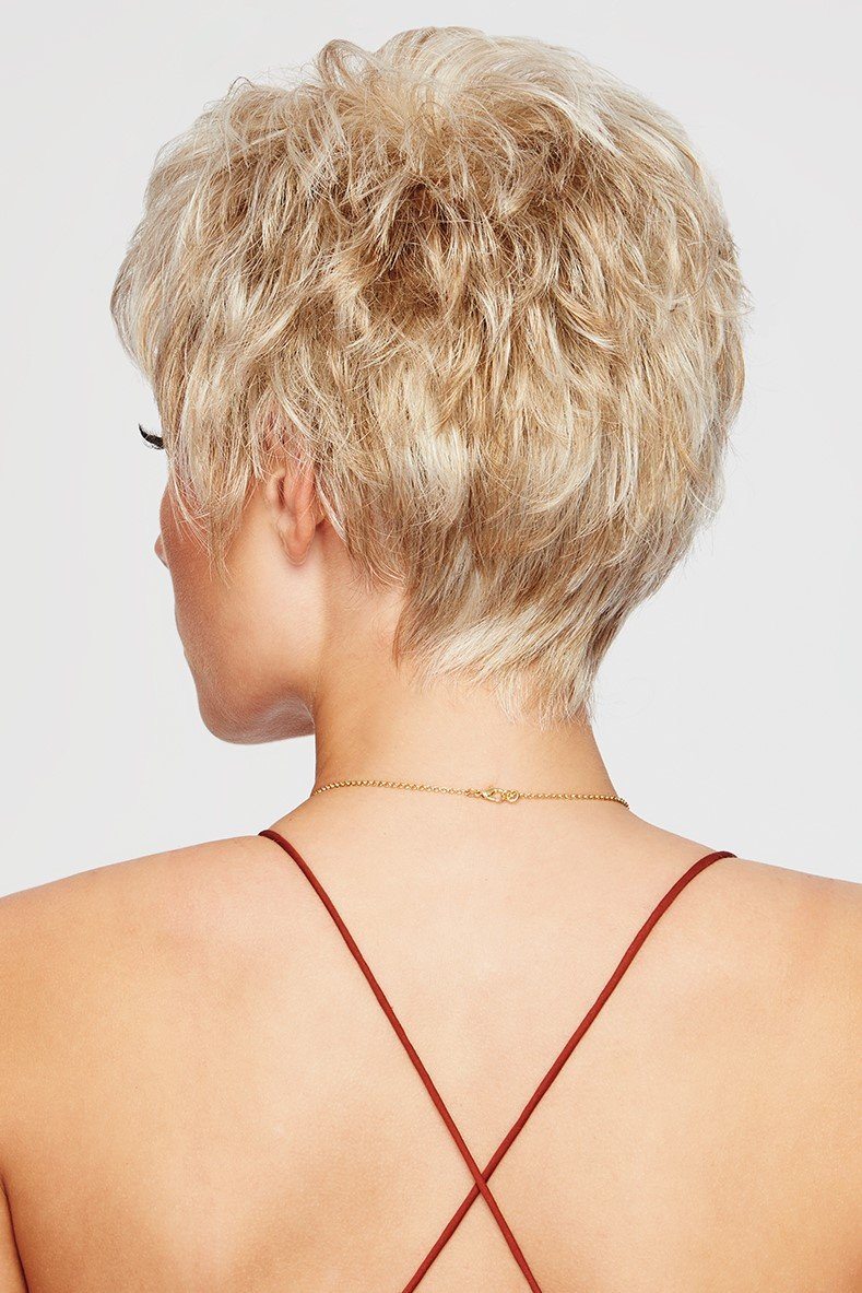 Back view of a person with short blonde hair wearing a red strappy top on a light gray background