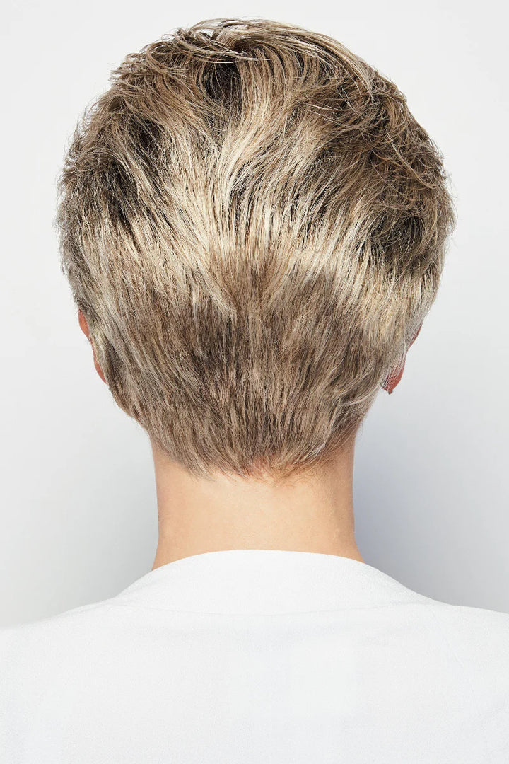 Back view of a person with a short, styled haircut on a plain background
