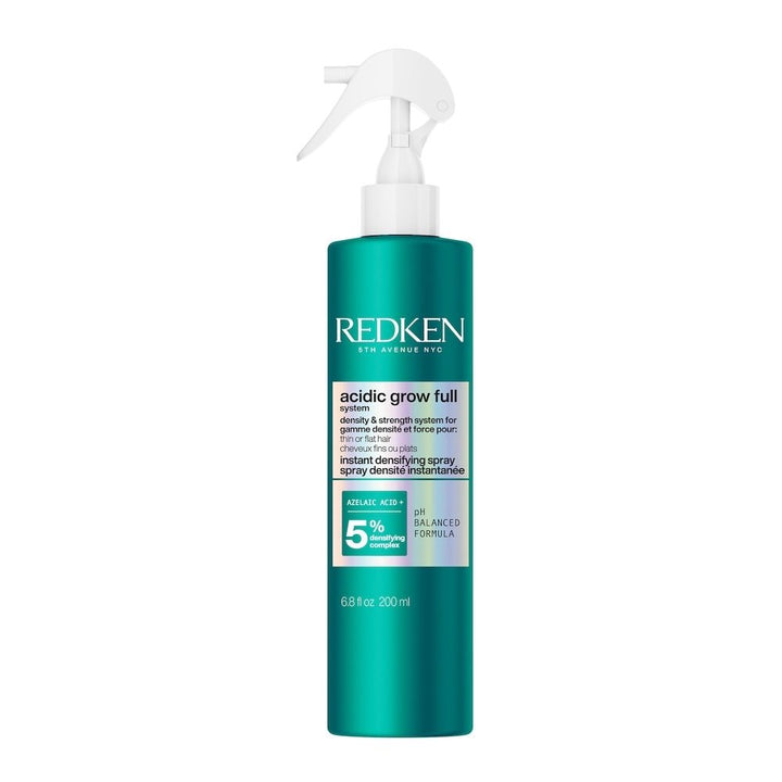 Redken hair care product on a white background