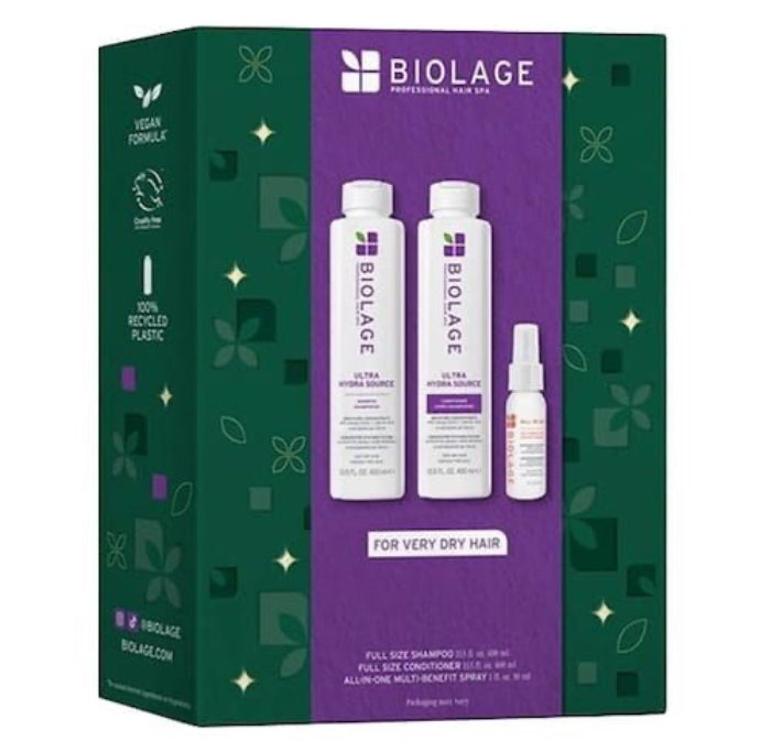 Biolage Professional Hair Care Full Size Shampoo, Conditioner, and Hair Repair Spray set in a green and purple gift box.
