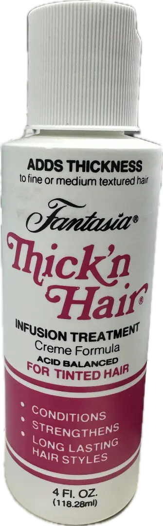 Bottle of Fantasia Thick'n Hair Infusion Treatment with a pink label, designed for tinted hair.