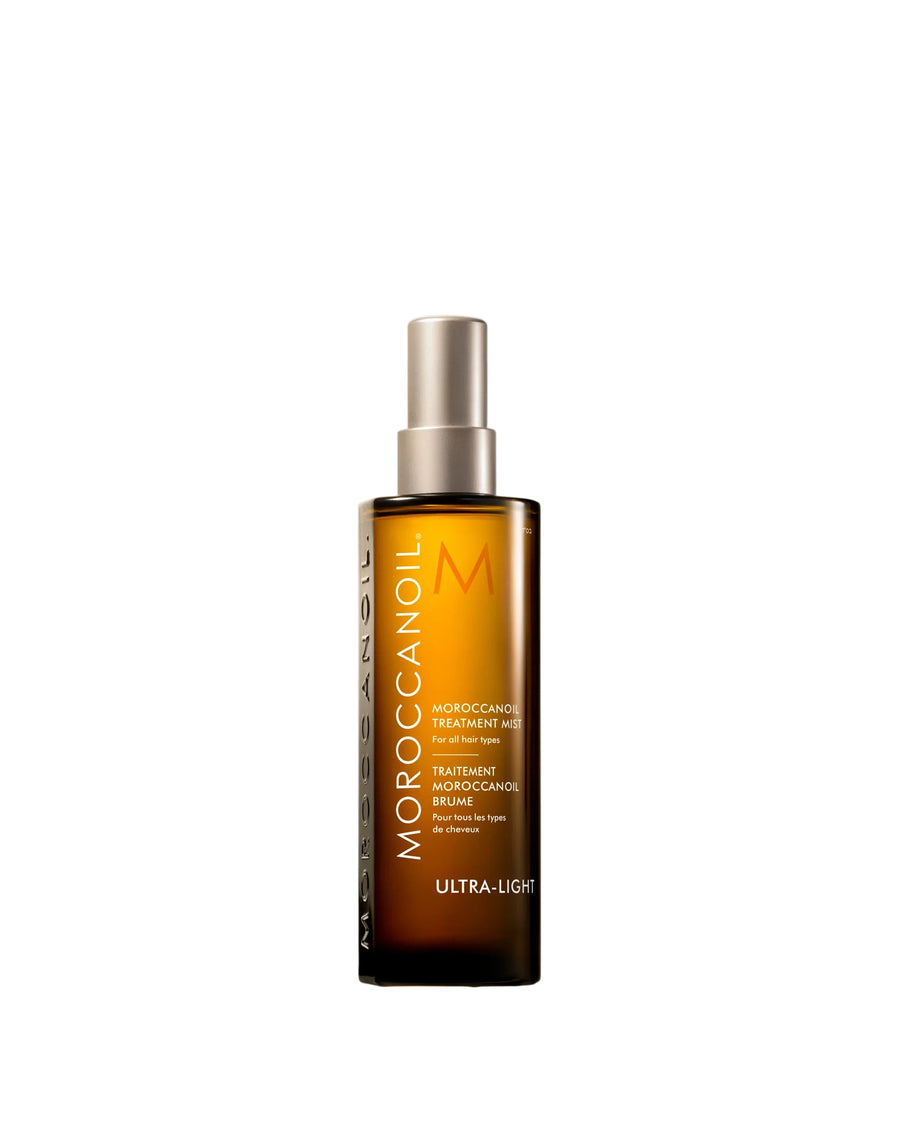 Moroccanoil hair treatment bottle on a light background