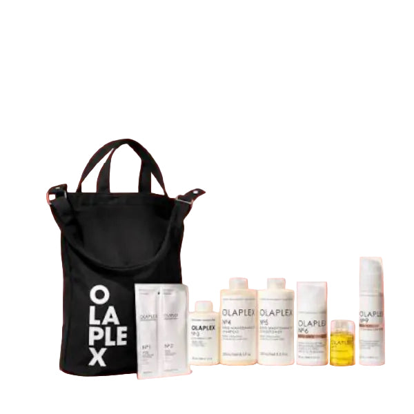 Black Olaplex tote bag with various Olaplex hair care products on a white background