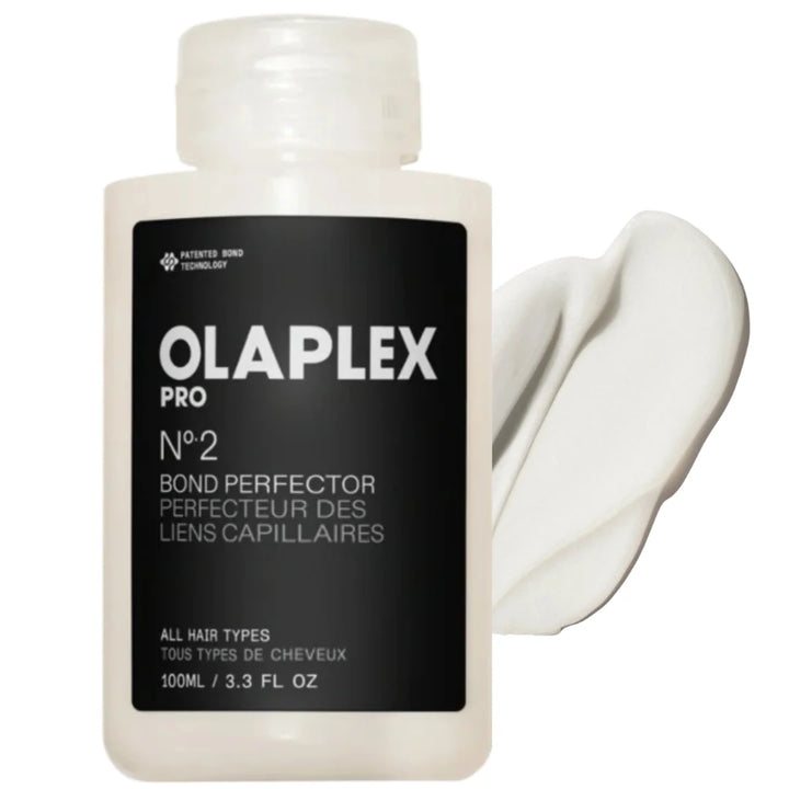 A bottle of Olaplex No 2 Bond Perfector hair treatment product.